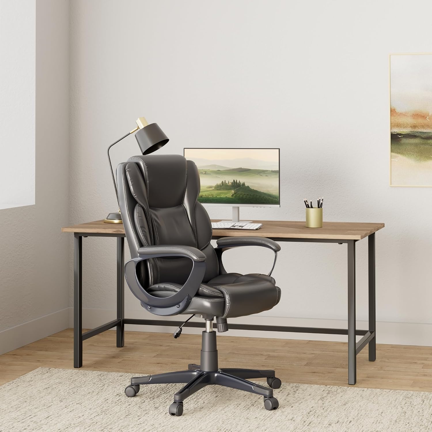 Staples Mcallum Ergonomic Manager & Executive Office Chair, Task Desk Swivel Chair with Wheels, Adjustable Height, Bonded Leather, Black